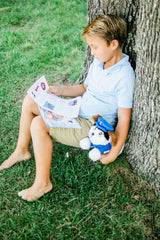 Boy reading letters from Milo